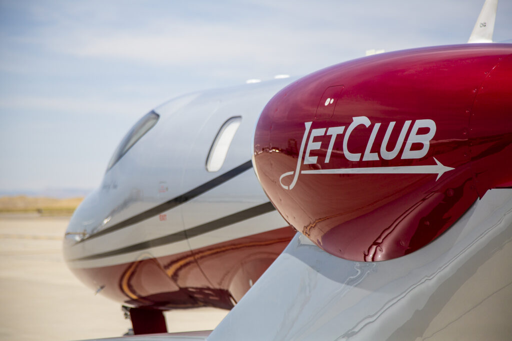 Image of a white with red linings aircraft from Jet Club Europe