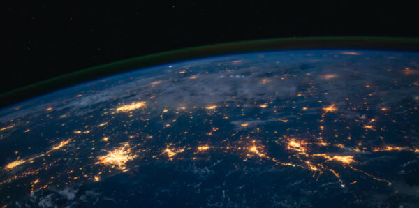 Image of earth at night from space showing the lights from cities