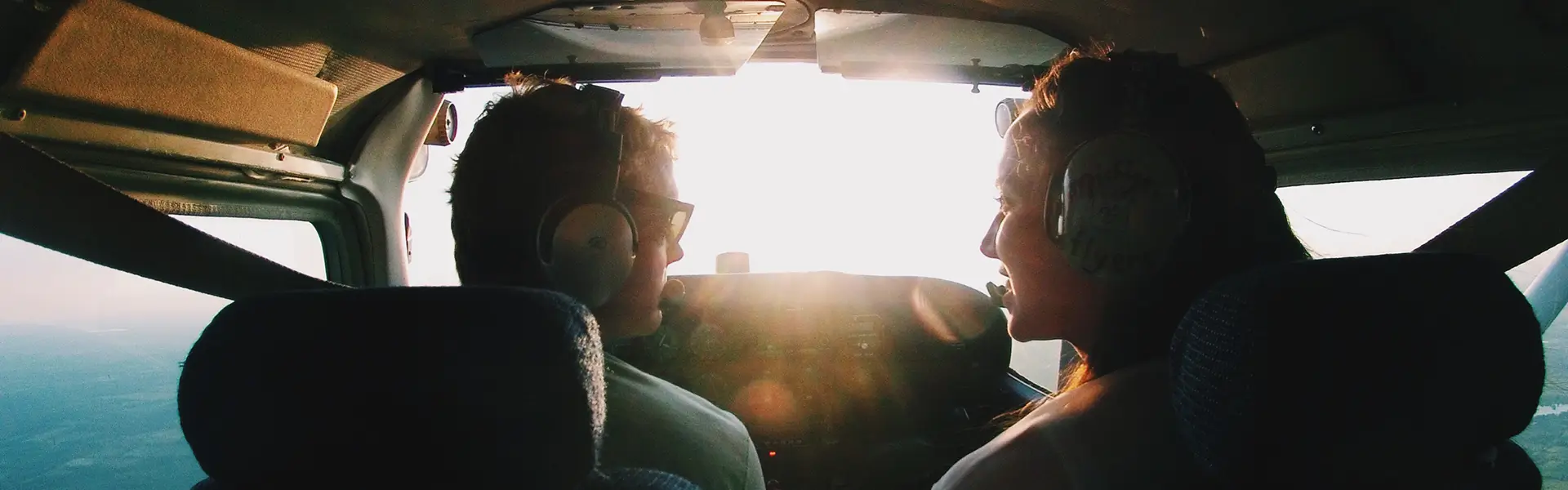 Cockpit with pilot and co-pilot in a private jet.