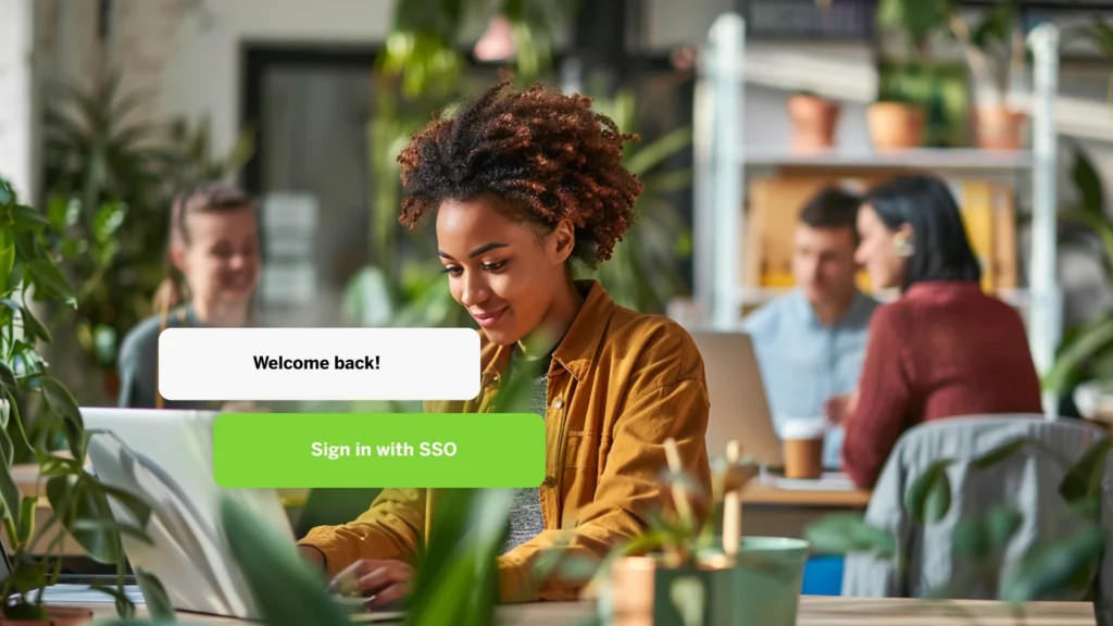 Woman working at computer and signing in using single-sign-on