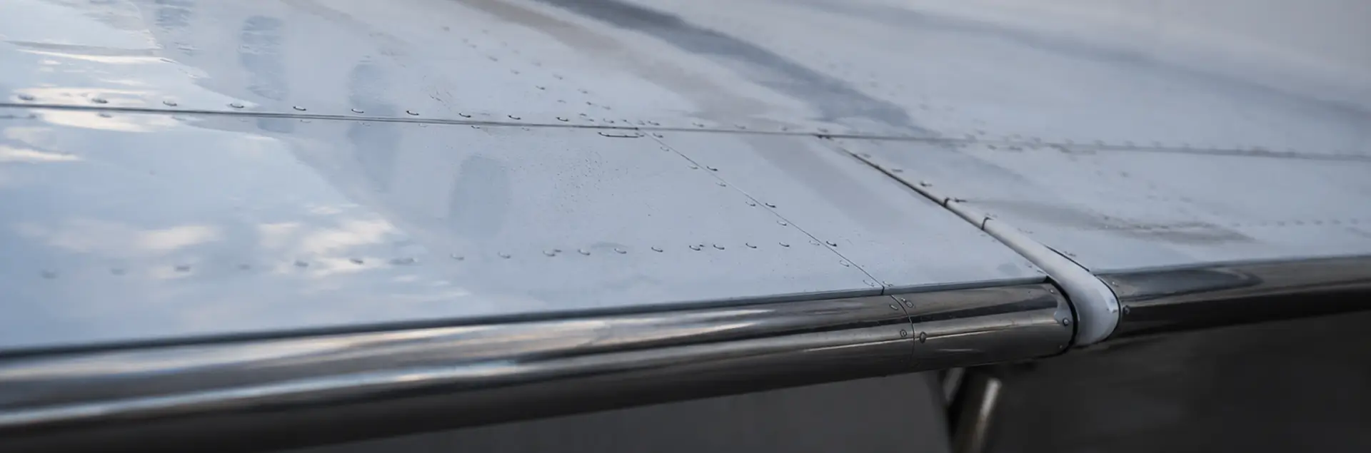 Close-up hero image of an airplane wing.