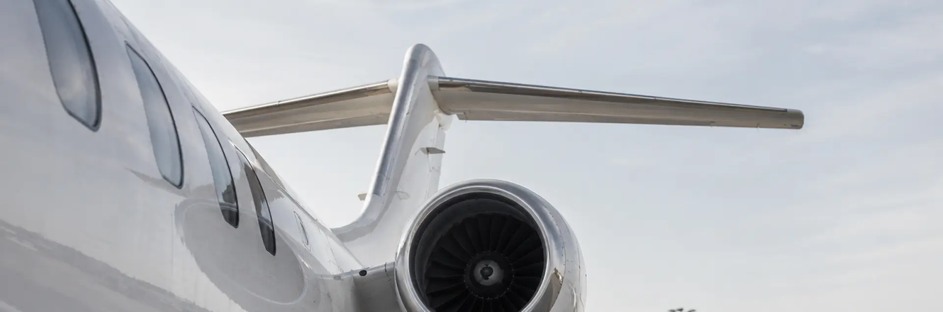 Hero image of an airplane's tail.